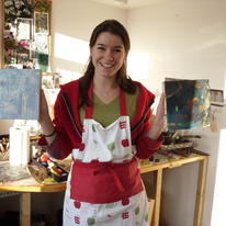 Kirstie with her two finished encaustic paintings