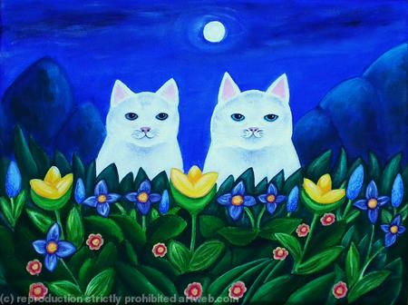 White cats in the garden