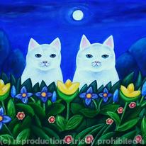 White cats in the garden