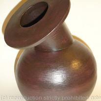 Black stoneware bottle with angled neck