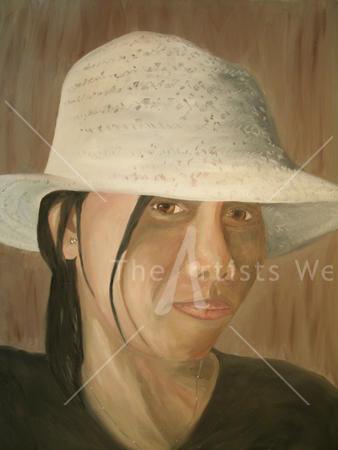 Lovely Filipino lady wearing stylish hat.