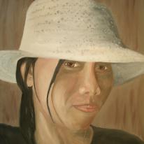 Lovely Filipino lady wearing stylish hat.
