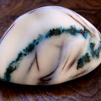 From the hand, glass form.