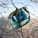 Looking glass | | | Coloured glass element & fabric, window mounted display. Looking glass
