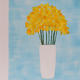 Daffodils in a White…