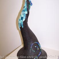 Female sculpture with mosaic jacket