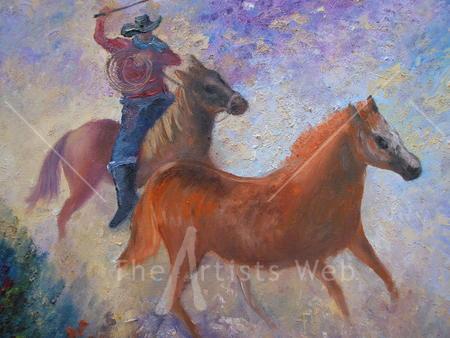 horses galloping across the prairie