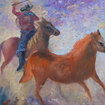 horses galloping across the prairie
