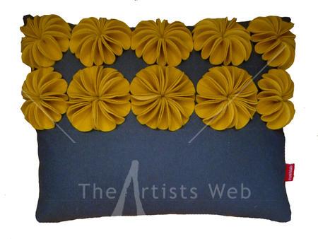yellow and grey raised disc cushion