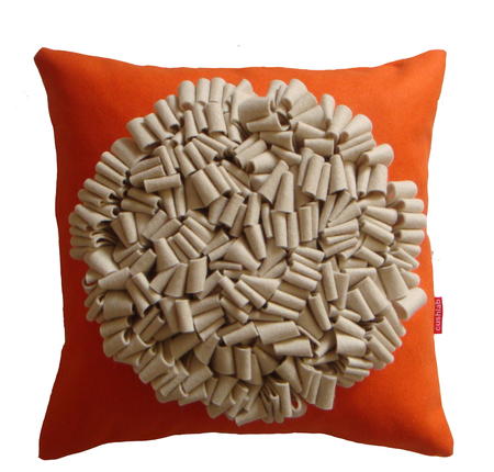 cream on orange looped cushion