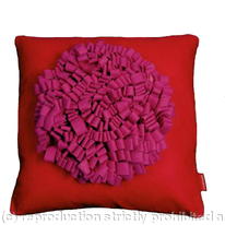 pink and red loop cushion