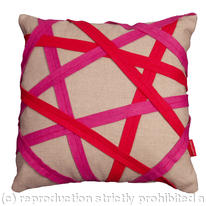 pink and red binding cushion