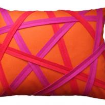 pink red and orange binding cushion