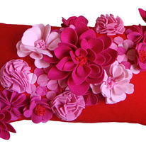 Pink and red floral cushion