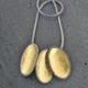 Leaf necklace | | | oxidised silver and yellow gold leaf Leaf necklace