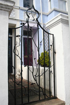 gate with minuret topvine work detail
