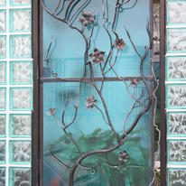 glass  steel gate with vine detail