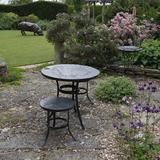 Furniture on display at Clay Barn exhibition - Slate, stained glass, stainless steel on galvanised wrought iron