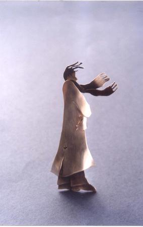 man with scarf blowing