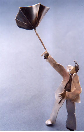 Man with inside out umbrella