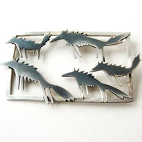 pack of wolves brooch