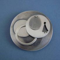 spheres brooch