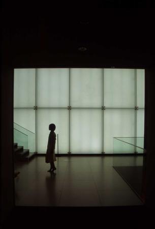 a girl in front of art