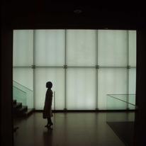 a girl in front of art