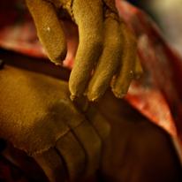 Detail of Mercy's hands.