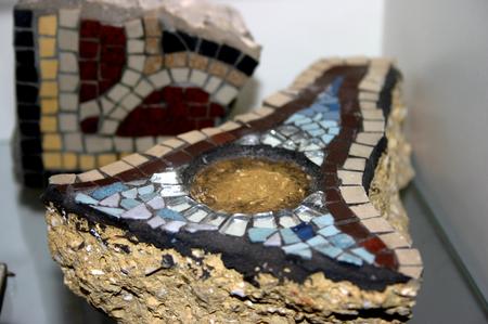 Mosaics made on Stone , to look ancient for Roman School days