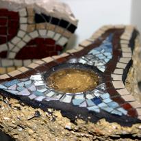 Mosaics made on Stone , to look ancient for Roman School days