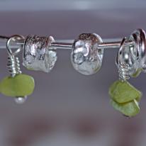 Handmade Sterling Silver Charm Bangle With Detailed Sterling Silver Charms And Chipped Lime Green Gemstone Beading