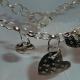 Hand Crafted Sterling… | £120(sold) | | Hand Crafted Sterling Silver Detailed Charm Necklace Hand Crafted Sterling…