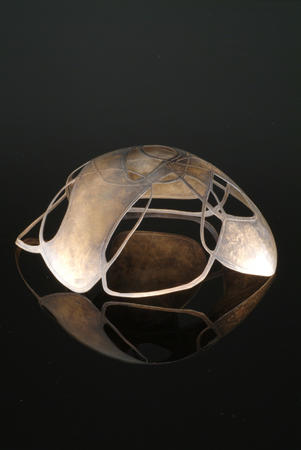 raised, etched and pierced bowl