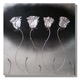 Four Silver Roses