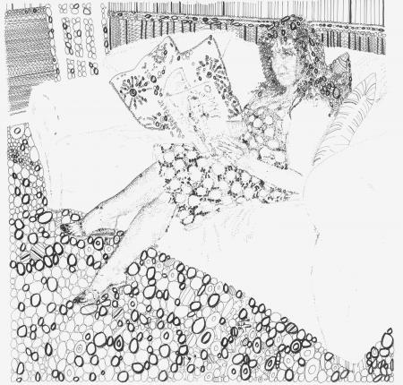Interior with Tracey  sitting on the sofa,  reading a magazine