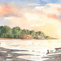 Sunset over lakeside cottages