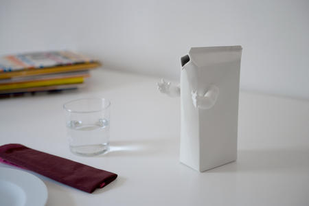 MILK CARTON. Arms forward. Glazed ceramics