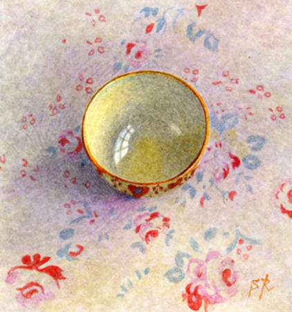 Bowl on pink and blue fabric