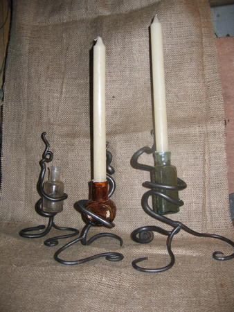 three single candle holders