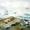 A rocky shoreline near…