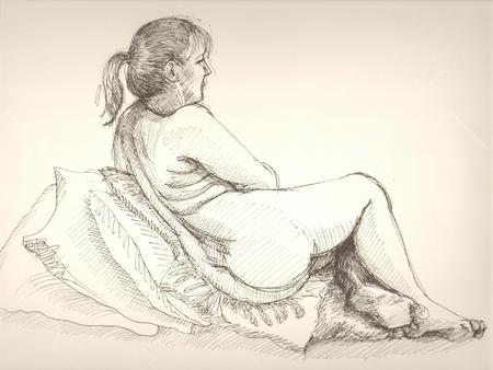 Sarah seated with cushions