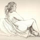 Sarah seated with cushions