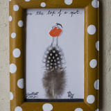 on-the-top-of-a-spot - cut out paper, pencil, watercolour, spotty feather, varnish on frame