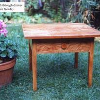 Coffee table, with through drawer