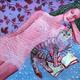 Purple nude, a book,…