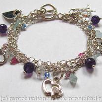 Love Is Everything Sterling silver charm bracelet