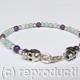 Silver skulls with Amethyst…