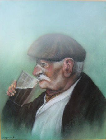 Old man drinking beer