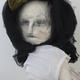 Girl with a black h…